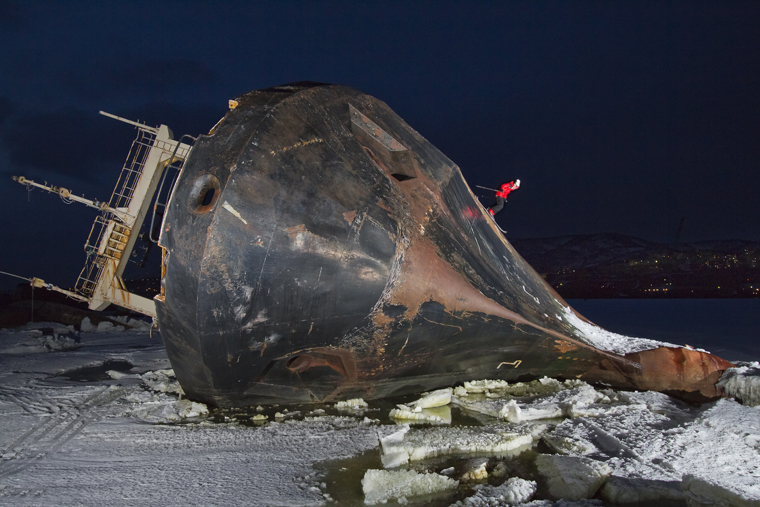 Guerlain Slides down the rusty shell of a stranded Vessel in Kamachatka