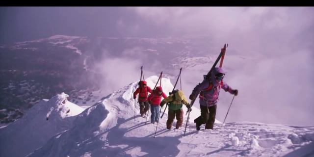 skiers climbing up Rishiri mountain
