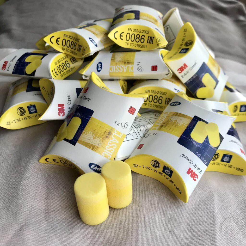 Yellow ear plugs for ski safety