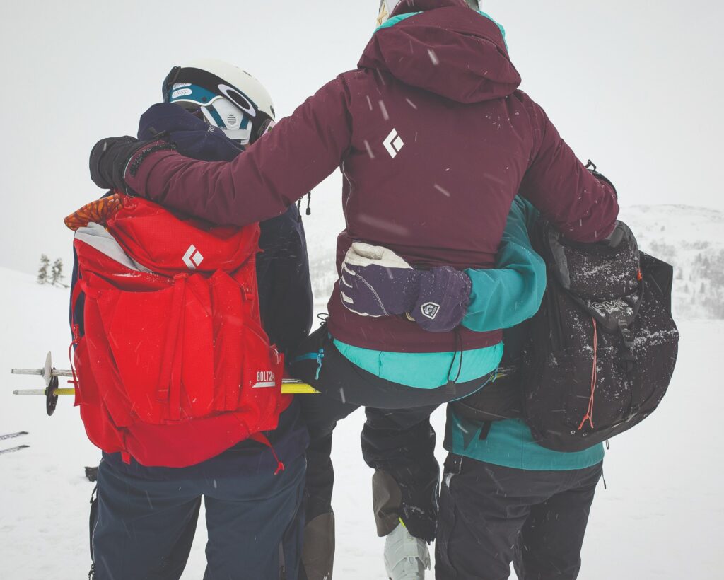 A skier being rescued and carried