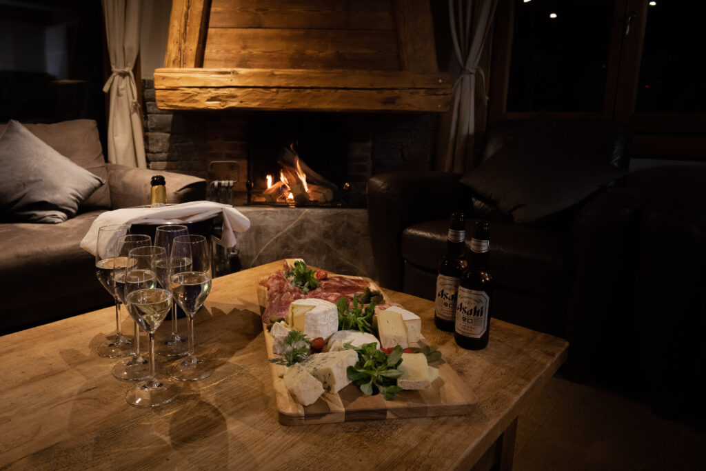 Catering by an open fire at an Atlas Ski Co chalet in Morzine