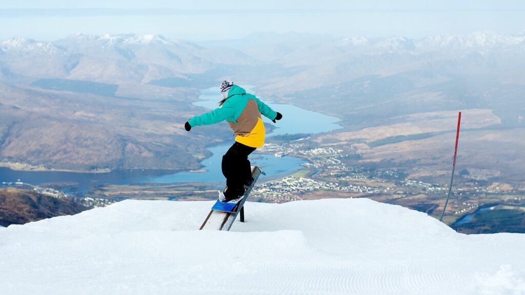 snowboarder Nevis Range over Lochaber