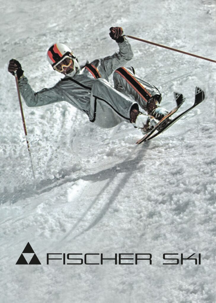 fischer ski poster from 1971 with skier in back seat in an air turn