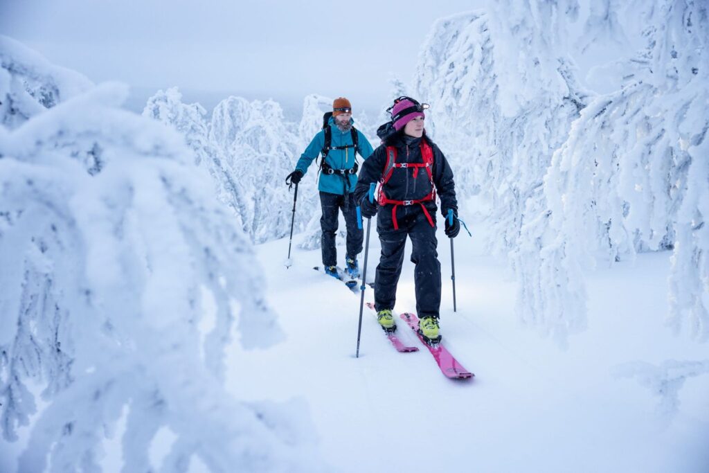 Ski tourers in Halti ski gear.
