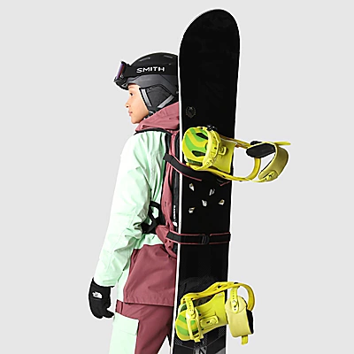 Slackpack 2.0 by The North Face in action, carrying a snowboard