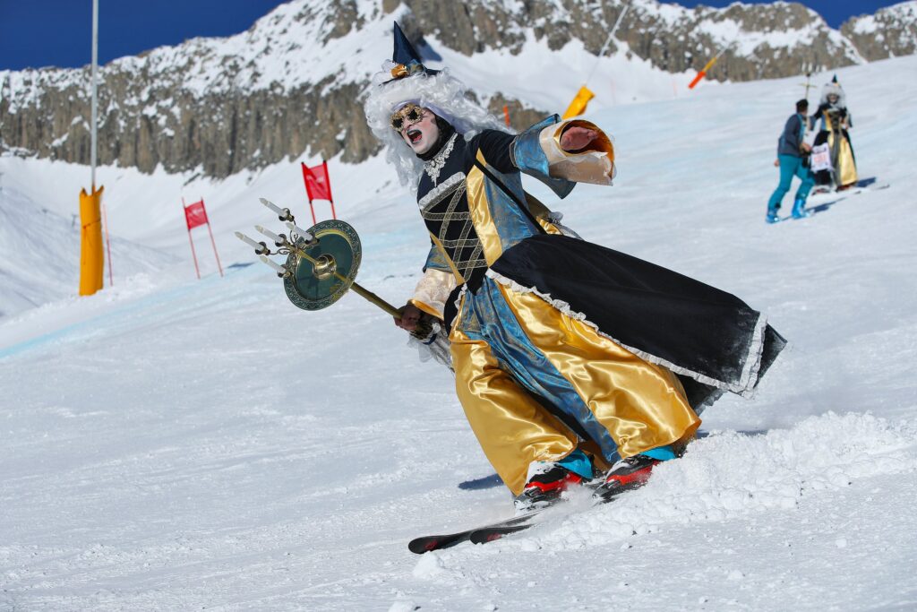 a dress up with skis down a slope