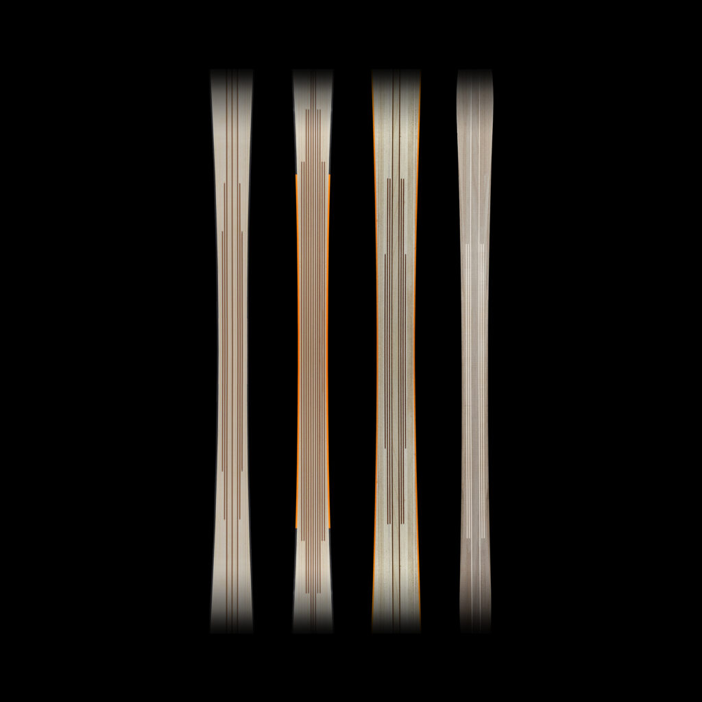 base of four individual skis on a photoshoot black background - the Blizzard Trueblend wood core skis