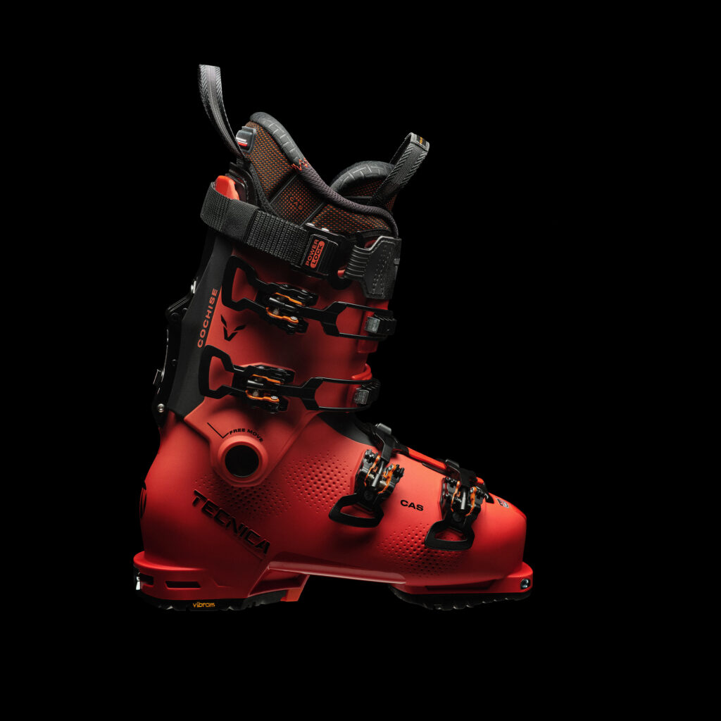 red ski boot on a photoshoot black background - the model is Cochise by Tecnica