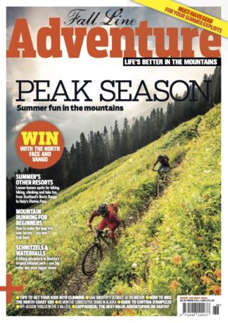 Fall Line summer Adventure issue cover, with cover picture of two mountain bikers on a trail through a wildflower meadow, a forest behind