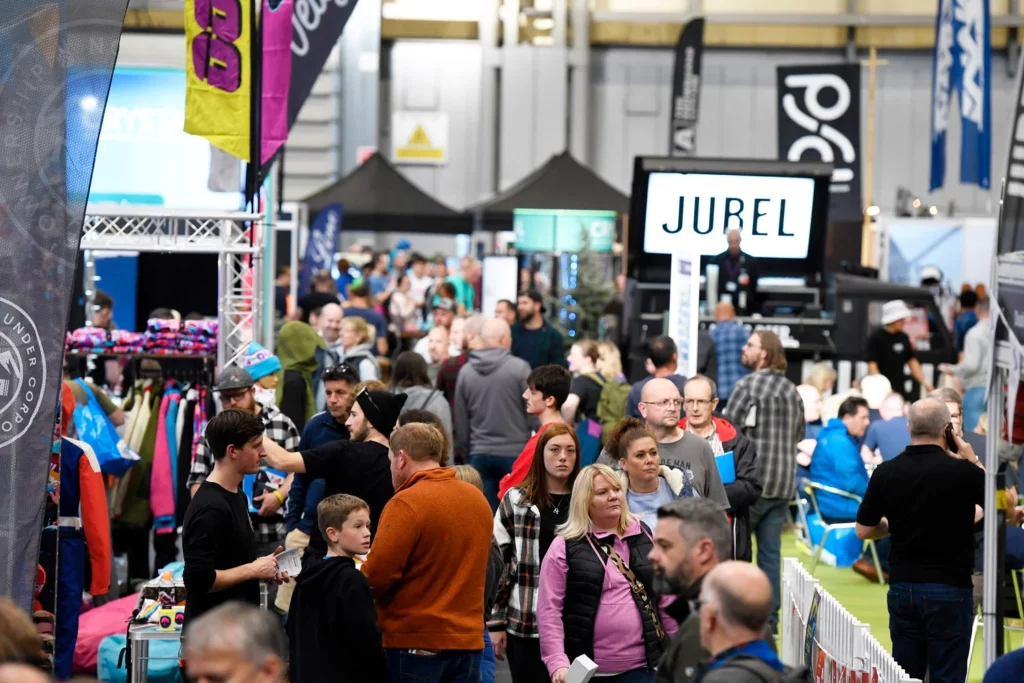 Visitors to the National Snow Show wander through the stalls