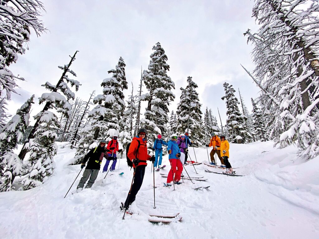 skier crew, standing on a snowy hillside