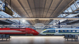 two eurostar trains sit nose to nose in a train station - one red, one classic white blue and yellow