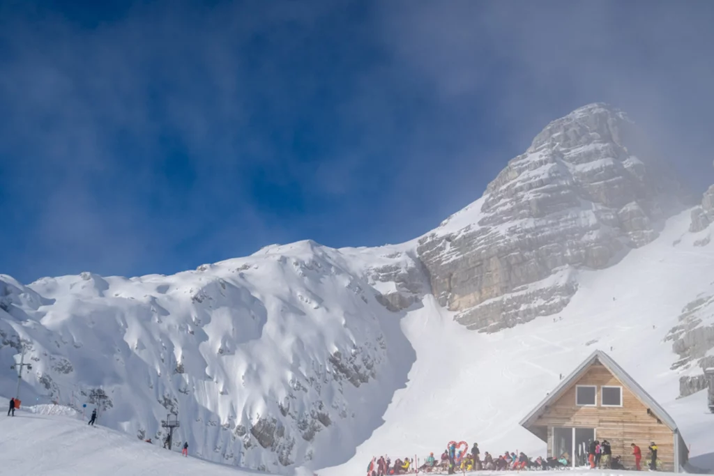 mountain hut in snowy julian alps