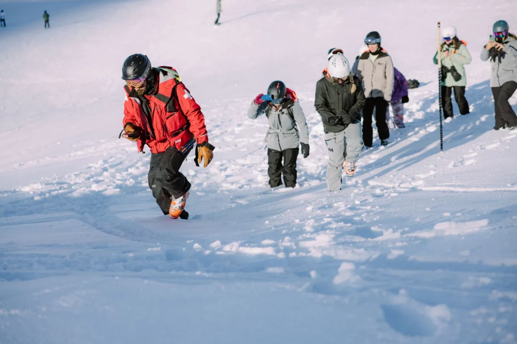 ski patrol leads a transceiver search