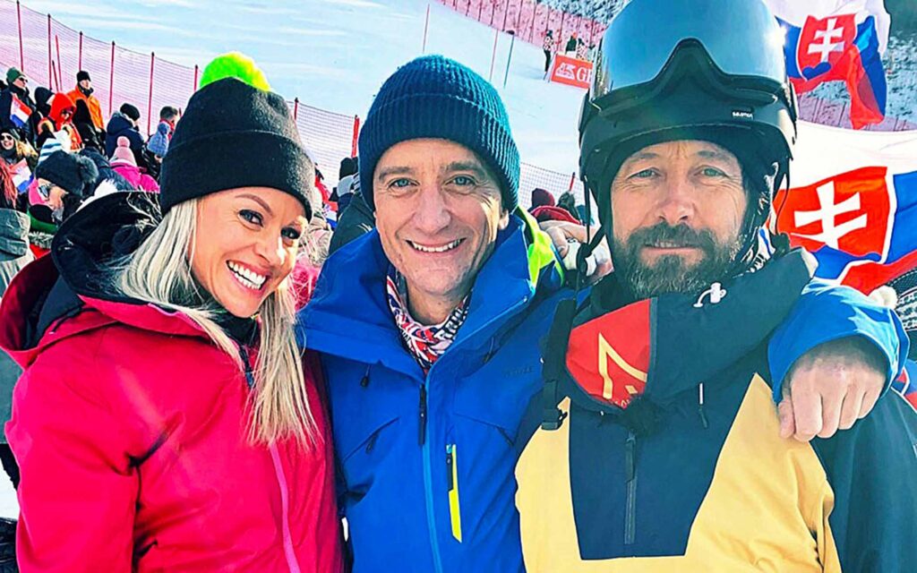 Ski Sunday presenters Chemmy, Graham and Ed, smile into the camera