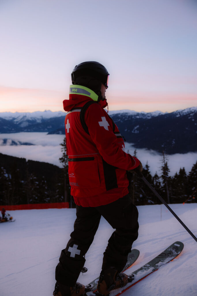 dawn or dusk, and ski patrol looks out over empty ski area
