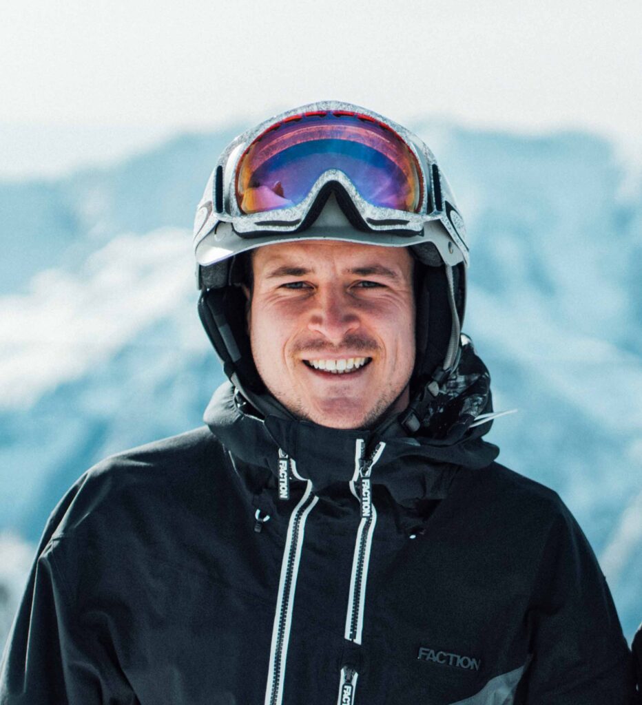 Carv CEO Jamie Grant in ski jacket and goggles on helmet smiles into camera