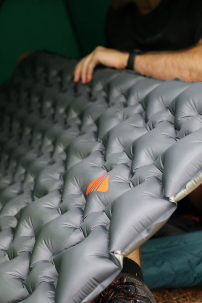 an inflatable camping mattress